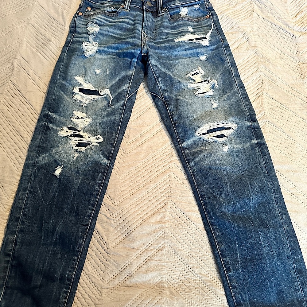 Distressed Blue Denim Jeans